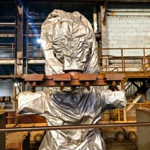 Industrial robot protective cover used for heavy material handling in manufacturing workshop